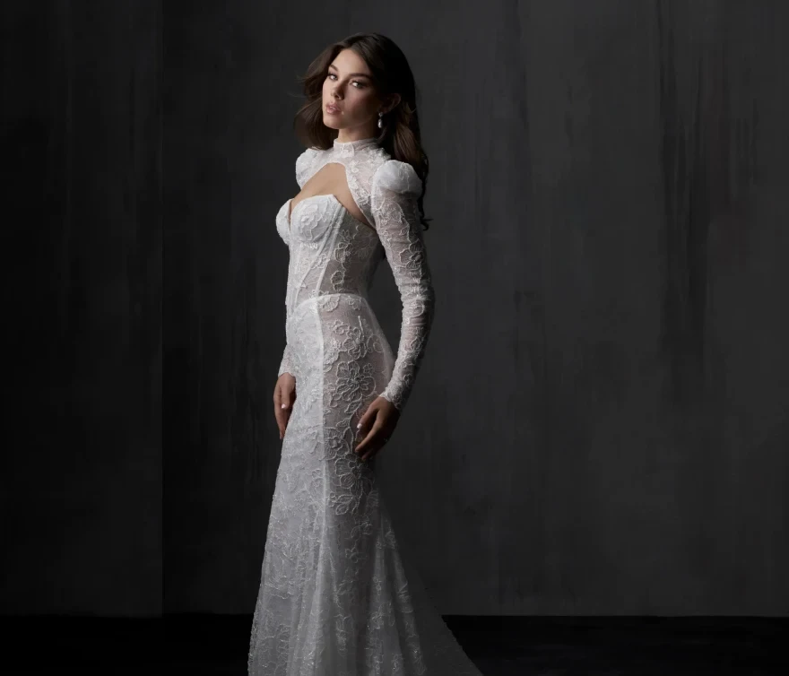 Model wearing a dress by Allure Couture.